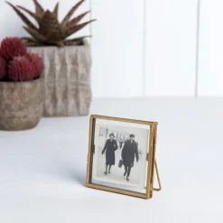 Glass and brass metal standing frame (8 x 8cm)